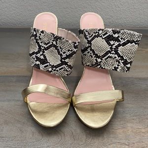 Gold and snake skin heels